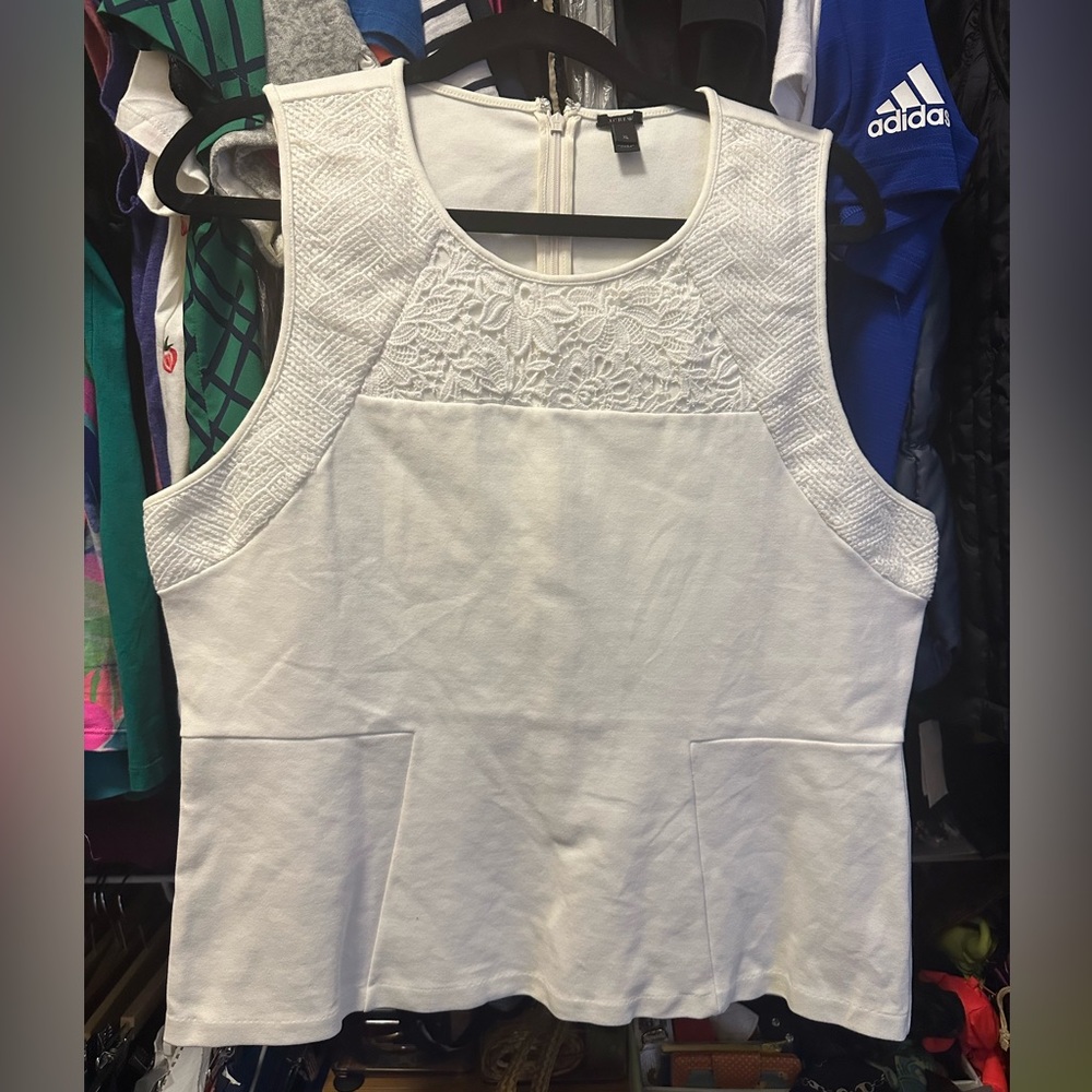 Embroidered peplum top off white